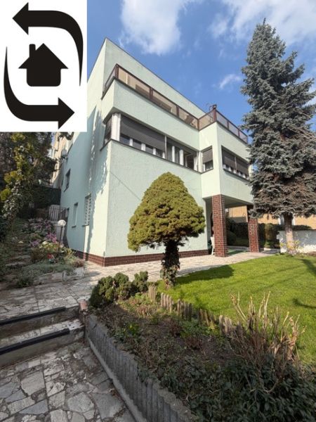 A villa on Bradlianska Street in Bratislava - Old Town with a garden and landscaped walkways.