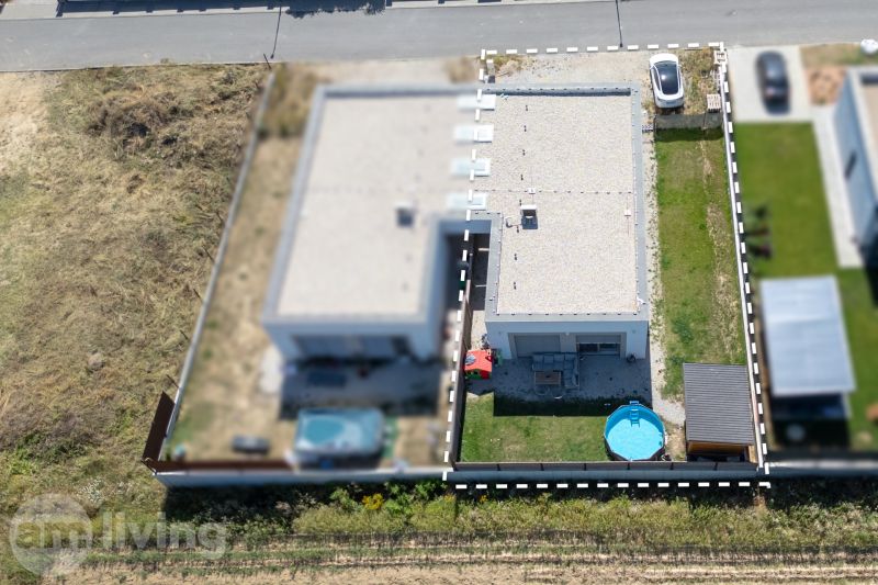 A family house in Trenčianske Jastrabie with a pool and a garden in a closed yard.