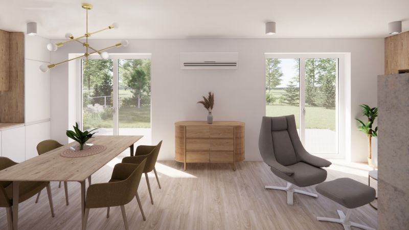 Kitchen and living room in a family house with a wooden decor floor, table, and chair.