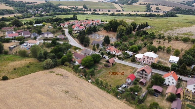 Plots - living in the picturesque village of Podbranč with an area of 1,026 m², surrounded by greenery.