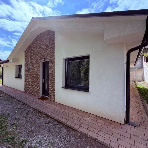 A family house on Zadarska Street in Banska Bystrica with a brick facade cladding.