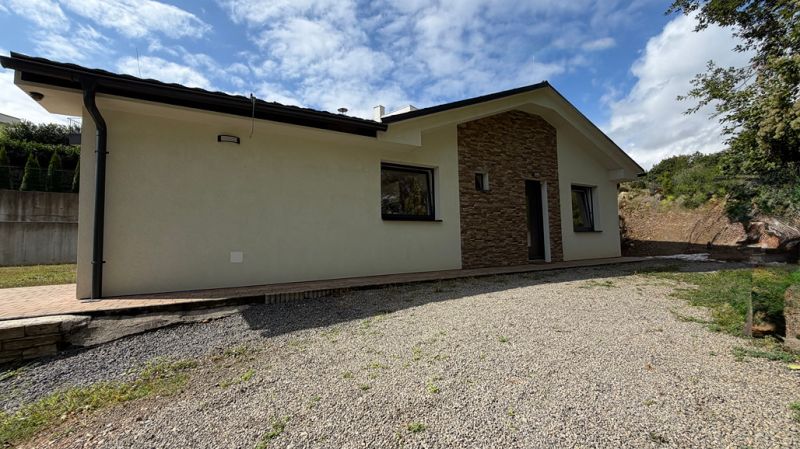 A family house on Zadarska Street in Banska Bystrica with stone cladding.