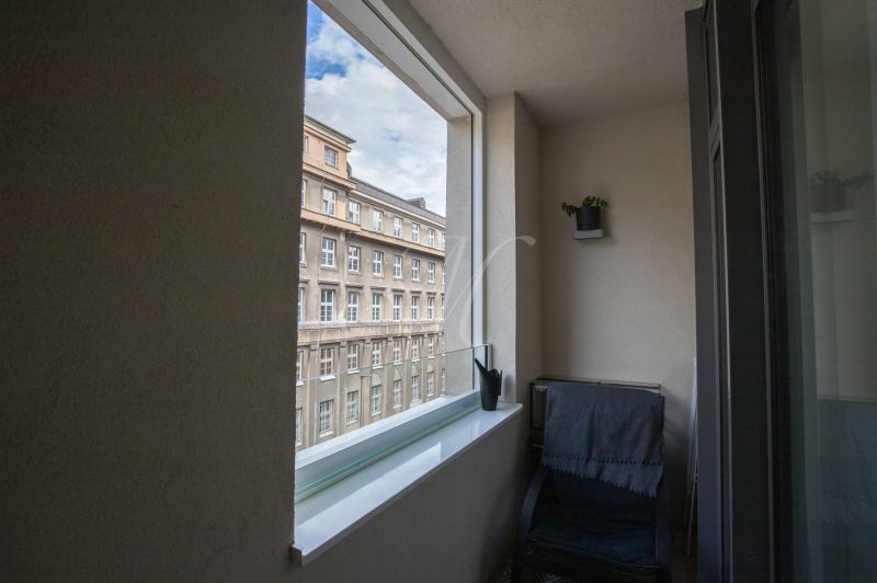 Balcony with a view of a historic building, 2-room apartment, Bratislava - Old Town, Bezručova.