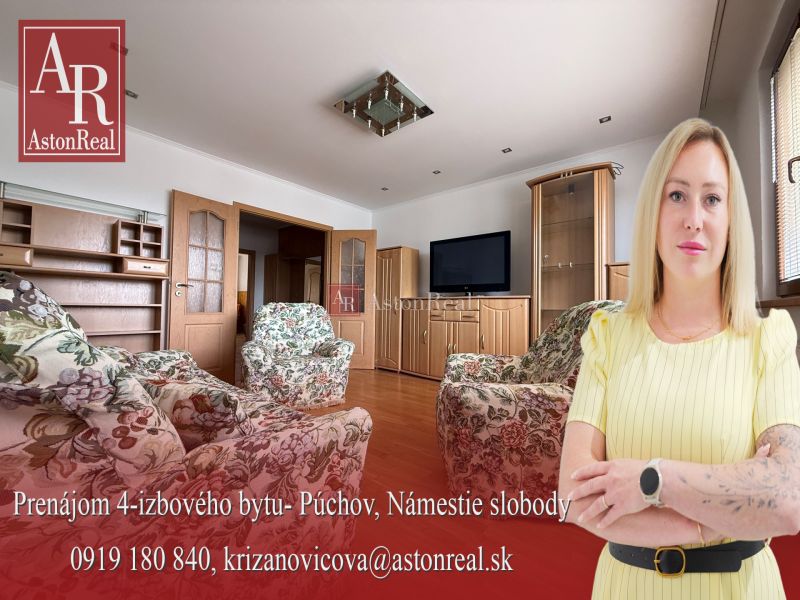 Living room in a 4-room apartment with a wooden decor floor and floral furniture.
