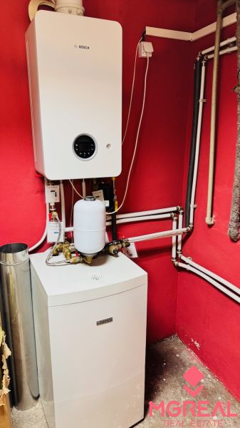 Heating in a family house with Bosch brand equipment and distribution systems.