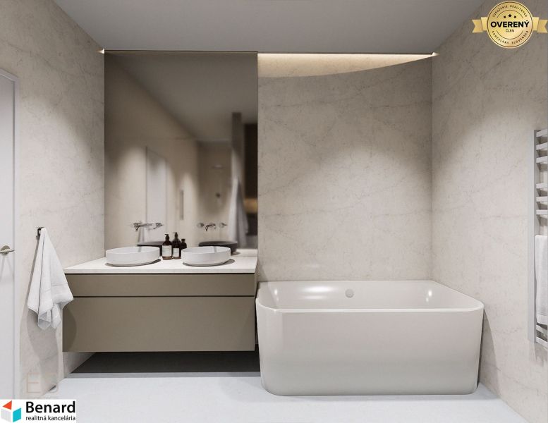 Bathroom of a 3-room apartment with a bathtub, two sinks, and a mirror on a light wall.