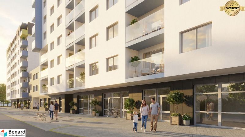 Apartment building with balconies and people on the street in Poprad, suitable for a 3-room apartment.