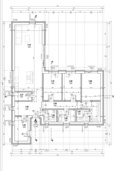 Floor plan of a family house with zones for the kitchen, living room, bedrooms, and bathrooms.
