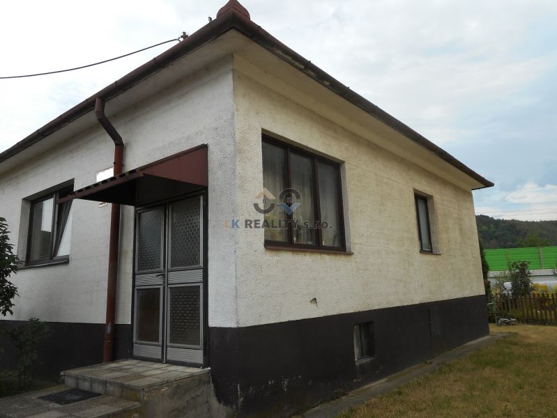 A family house in Trenčín with a sloped roof and plaster facade.
