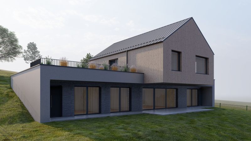 A family house in Staškov with wooden cladding and large windows.