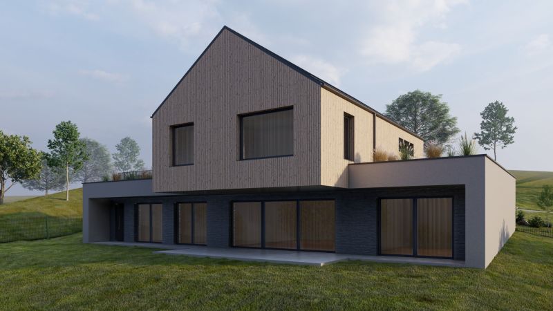 A family house in Staškov with glass doors and wooden cladding, surrounded by a lawn.