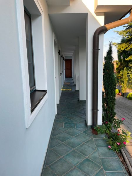 Hallway of a family house in Bratislava - Dúbravka with tiles and garden plants.