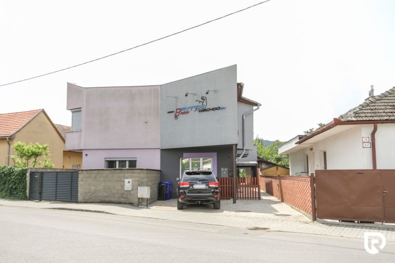 A family house on Kubranská Street in Trenčín with a garage and a driveway.
