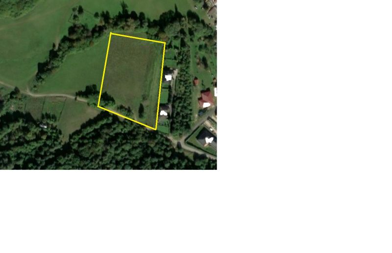 Plots - housing in Nitrianske Sučany, surrounded by greenery and trees.