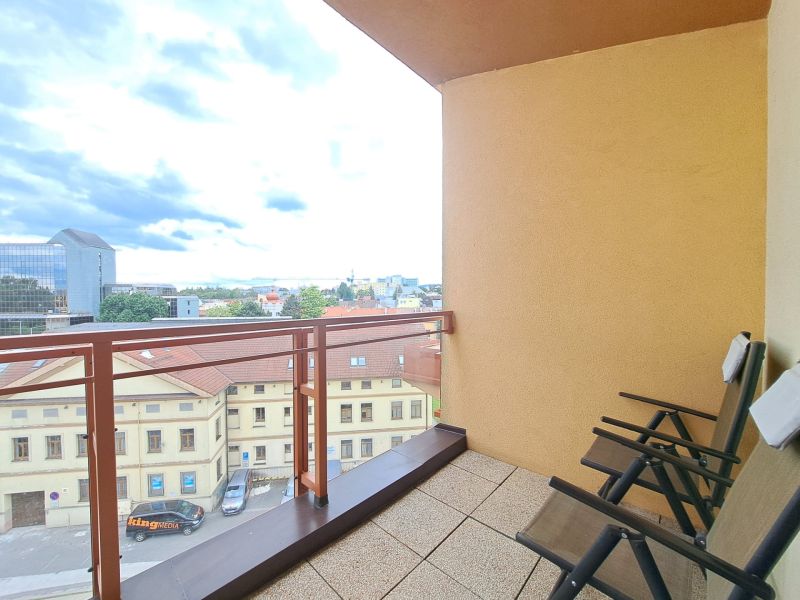 The balcony of a 2-room apartment with a view of Štefánikova Street in Poprad.
