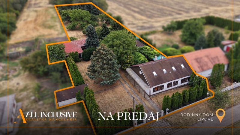 A family house in Lipové surrounded by greenery and a well-maintained garden for sale.
