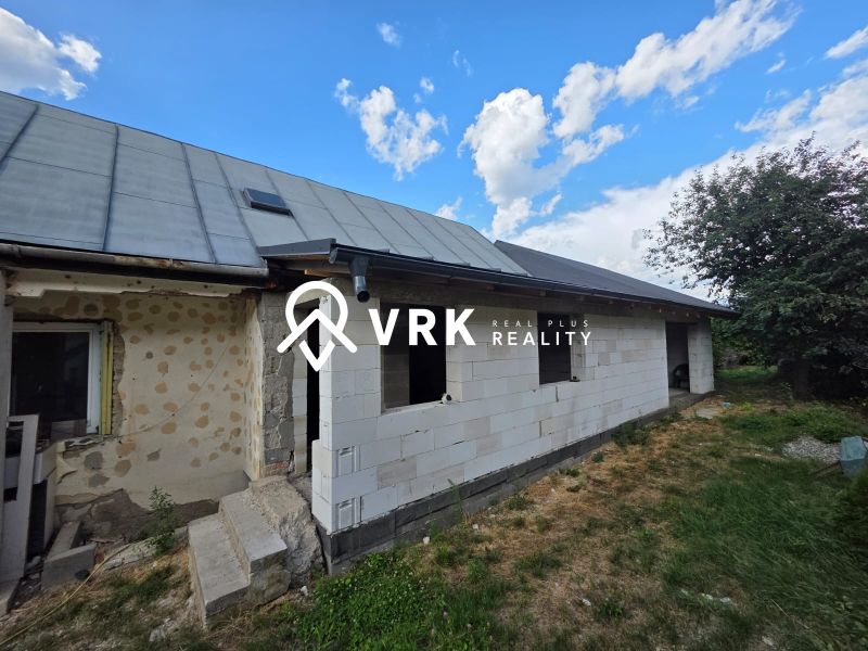 A family house in Kokšov-Bakša during renovation with incomplete facade cladding.