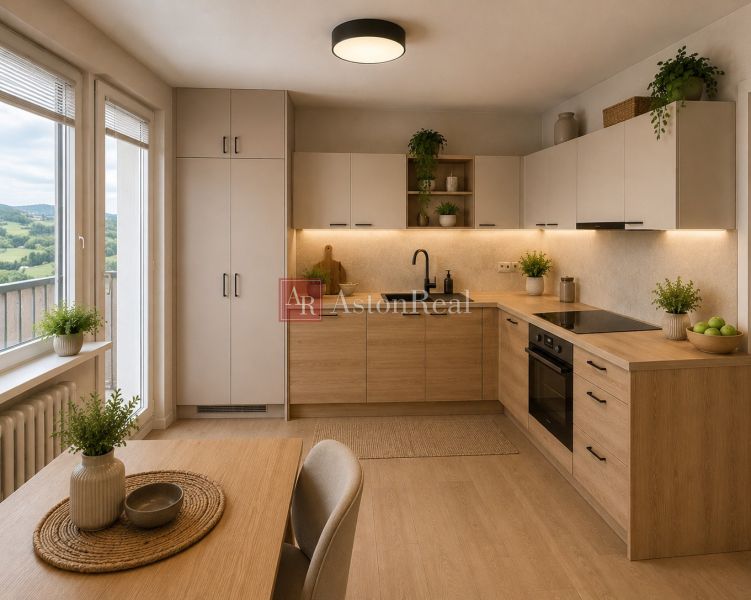 A kitchen in a 2-room apartment with a wooden decor floor and delicate plants.