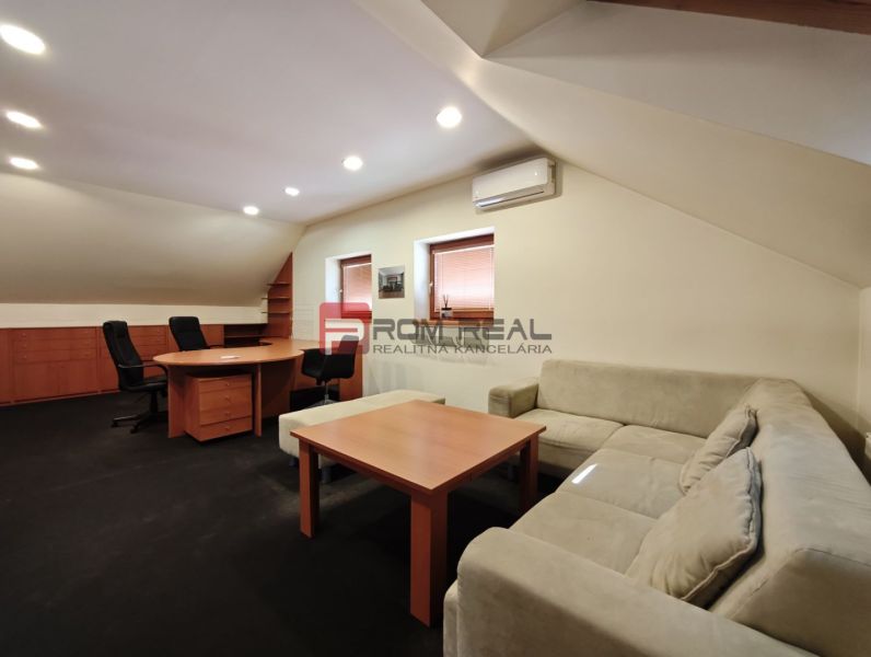 Production premises with a comfortable sofa, office furniture, and air conditioning.