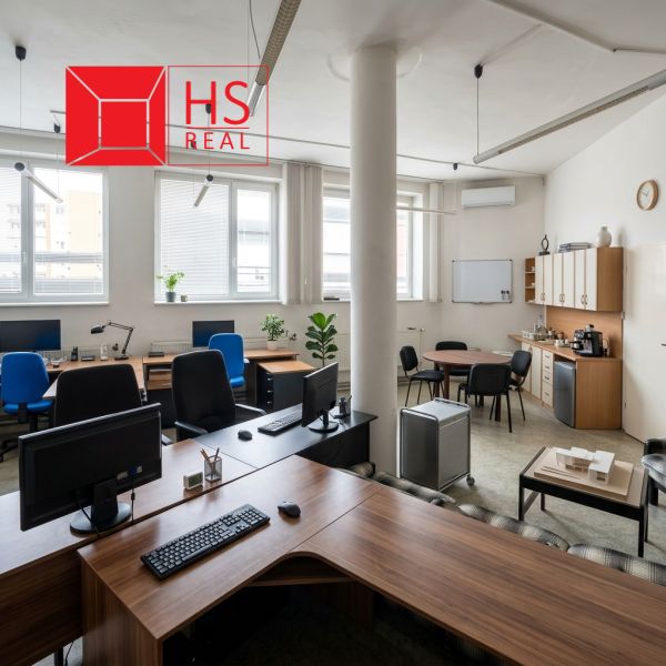Offices with computers and furniture in a spacious interior with a wooden decor floor.