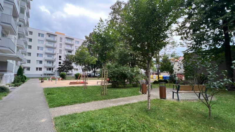 Apartment buildings with a playground on Dušana Madačova Street in Ružomberok offer peaceful living.