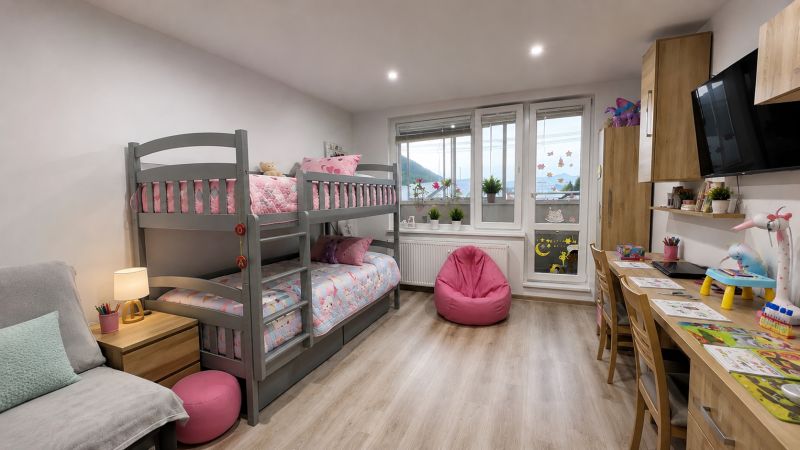 Children's room with a bunk bed, a desk, and a floor with a wooden decor.