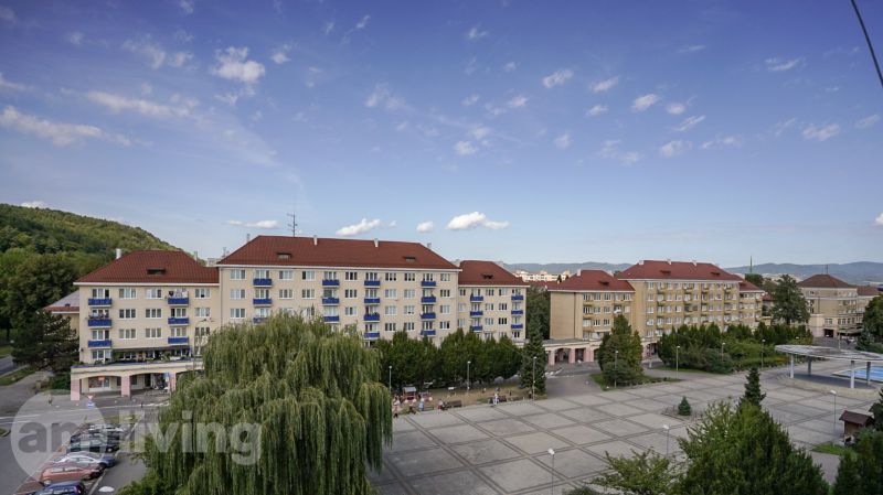 A view of Sad kpt. Nálepku in Nová Dubnica with apartment buildings in the background.