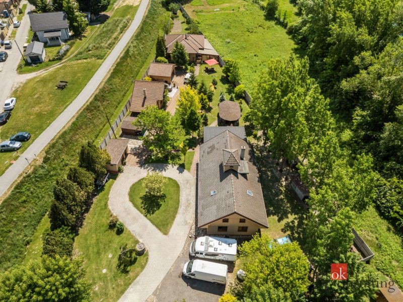 Aerial view of a family house in Hamuliakovo surrounded by greenery and nature.