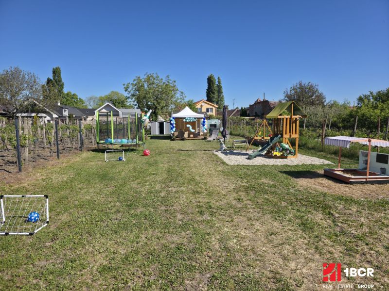 Playground and garden on a residential plot, Holubyho Street, Pezinok.