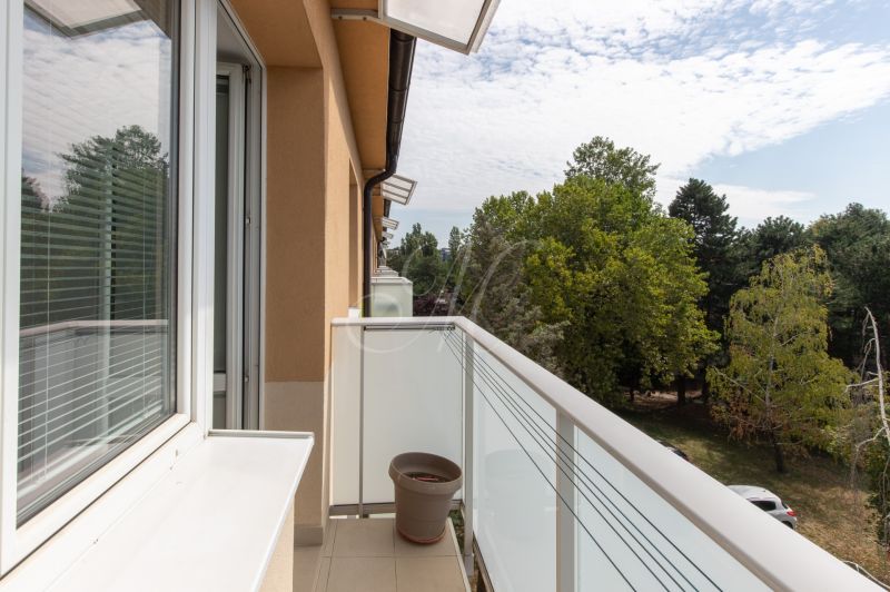 Balcony of a 3-room apartment with a view of greenery, Poludníková Street, Bratislava - Ružinov.