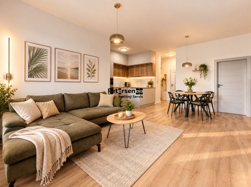 Living room in a 4-room apartment with a sofa and decorations, wooden decor flooring.
