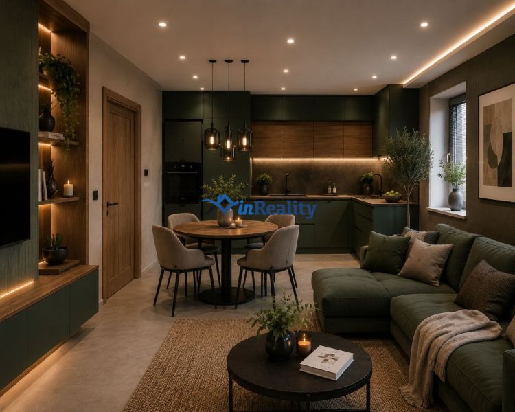 Living room with kitchen in a 2-room apartment, with a wooden decor floor and plants.
