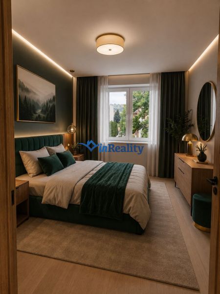 Bedroom in a two-room apartment with a bed, carpet, and wooden decor flooring.