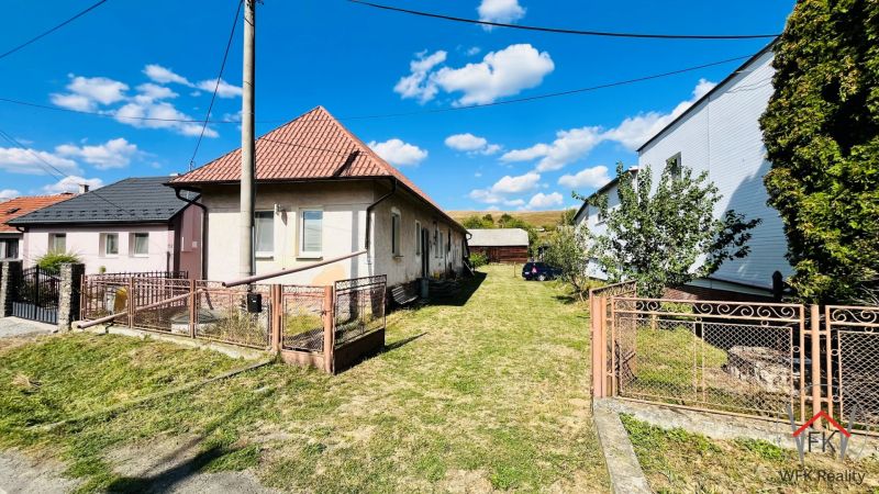 A family house in Ondavské Matiašovce with a spacious yard and a fenced garden.