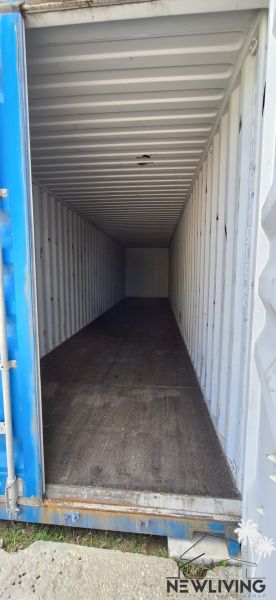 Open shipping container with a floor decorated for warehouses and halls.