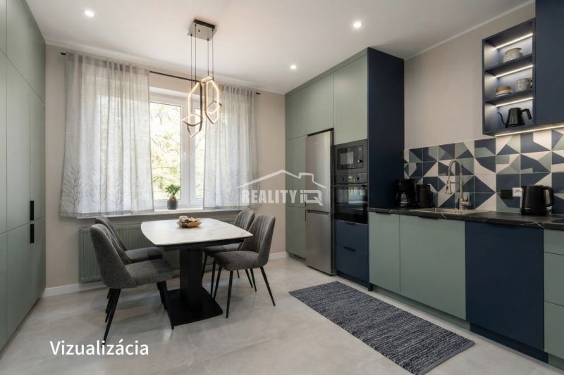 A kitchen in a studio apartment with a dining table, curtains, and built-in appliances.