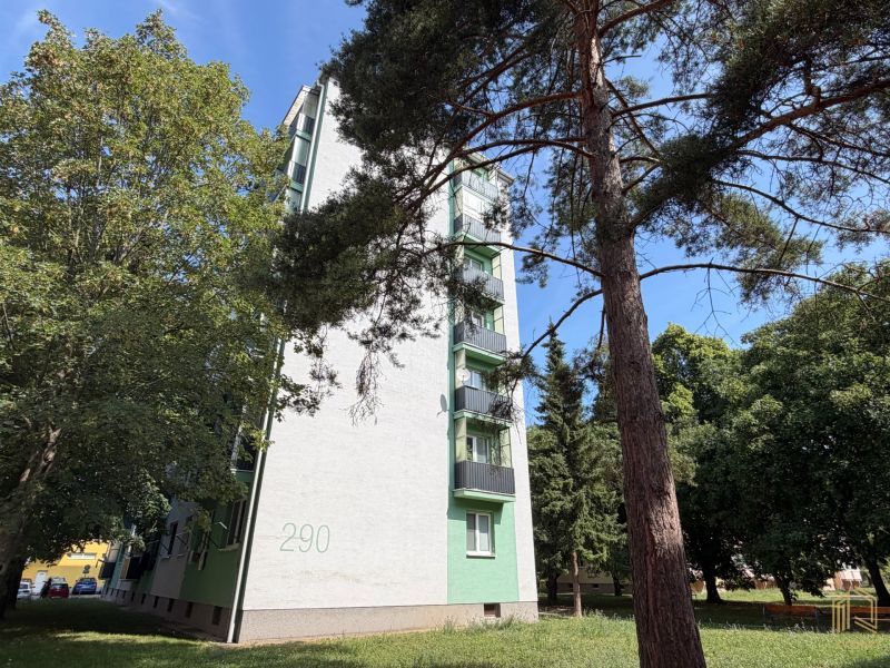 An apartment building surrounded by greenery on Palárikova Street in Senica offers 2-room apartments.