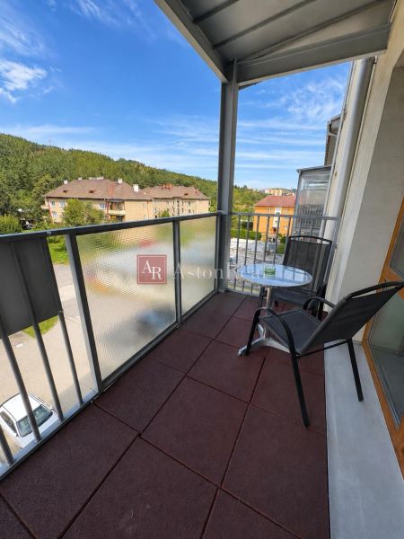 A balcony in a one-room apartment with a view of the surroundings of the town Liptovský Mikuláš.