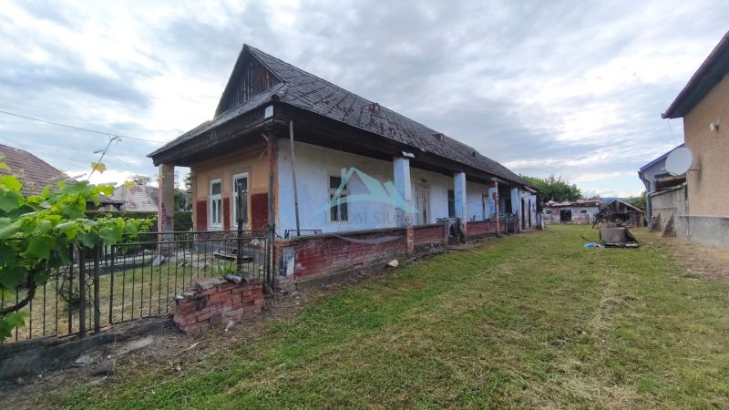 A family house in Opatovská Nová Ves, situated on a spacious plot with a garden.
