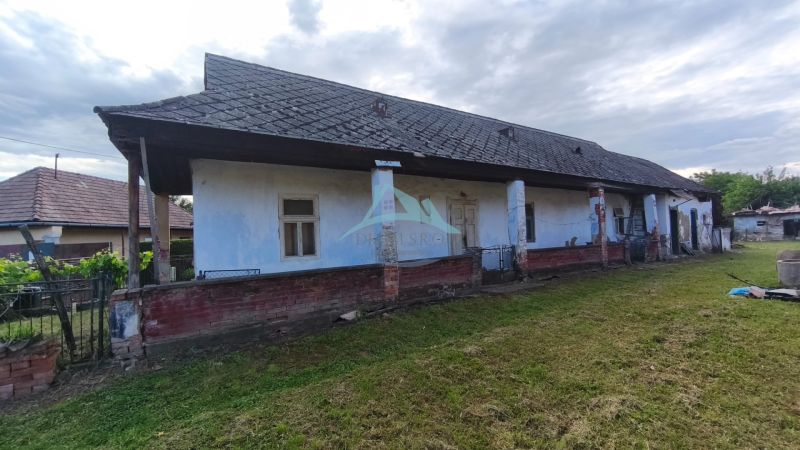 A family house in Opatovská Nová Ves with an older exterior and a sloped roof.