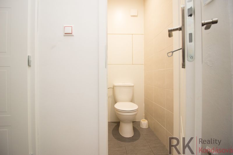 A bathroom with light walls and tiles in a 3-room apartment.