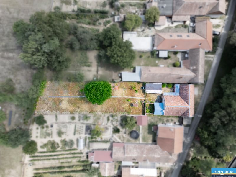 Aerial view of a family house at Vištuk 158 in the town of Vištuk with a garden.