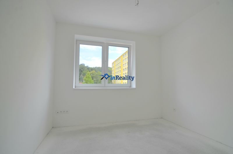Interior of a bright room with white walls in a 3-room apartment.