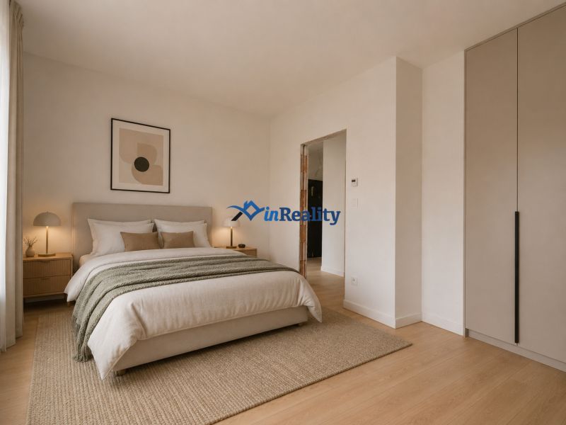 A bedroom in a 3-room apartment with a large bed and a floor with a wooden decor.