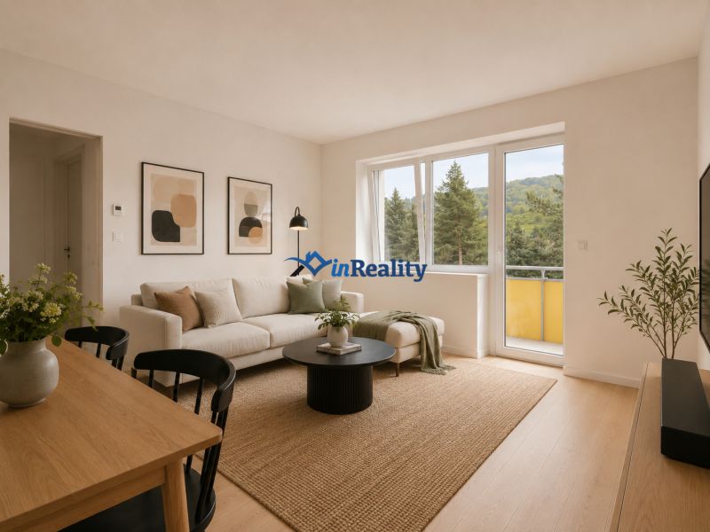 Living room in a 3-room apartment with a wooden decor floor and large windows to the terrace.
