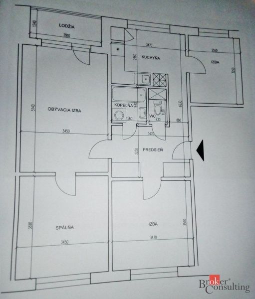 Floor plan of a 4-room apartment with a kitchen, bathroom, toilet, and loggia.