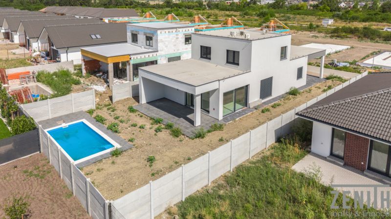 Family house on Sokolej-Kolibríkovej in Chorvátsky Grob with a garden and a swimming pool.
