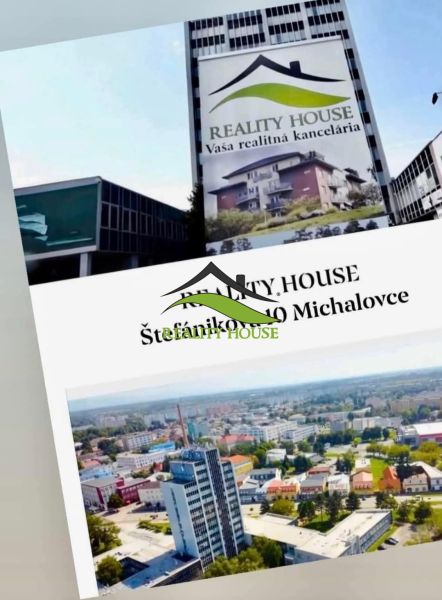 Building with a real estate agency advertisement on Štefánikova Street 10, Michalovce.