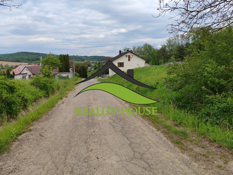 Plots - residential on Hlavná Street in Tovarnianska Polianka, surrounded by greenery and rural environment.