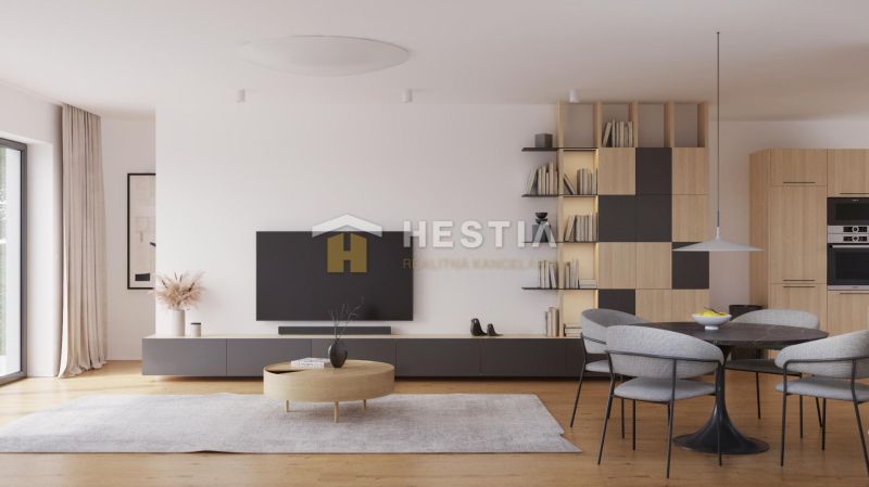 Living room in a family house with wood-patterned flooring, a television, and a dining table.